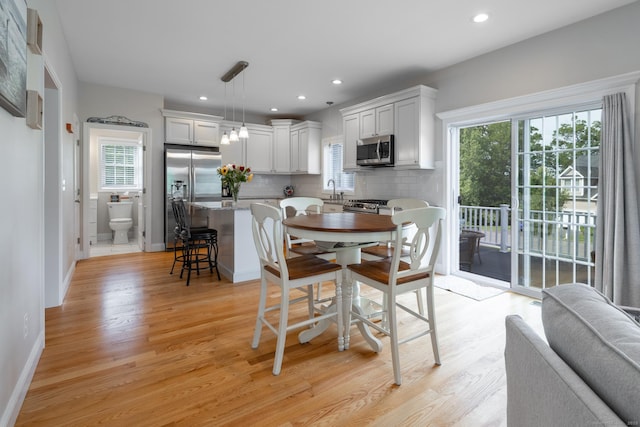 100 Silver Island Way Unit 100, Berlin, CT 06037 - dining space featuring light wood-style flooring, baseboards, and recessed lighting