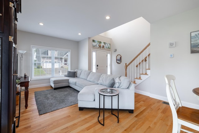 100 Silver Island Way Unit 100, Berlin, CT 06037 - living room with light wood-style flooring, stairway, baseboards, and recessed lighting