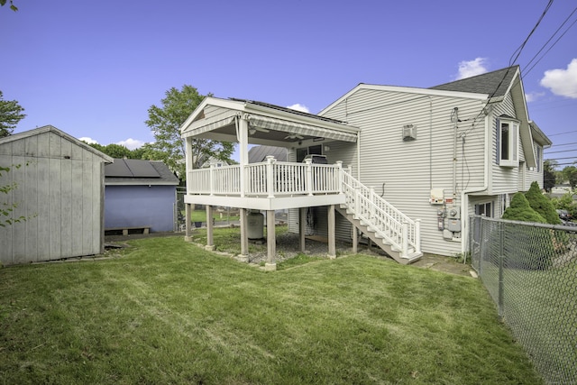 8 Lindsley St, Waterbury, CT 06708 - back of house with a wooden deck and stairway
