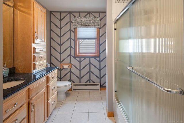 8 Lindsley St, Waterbury, CT 06708 - bathroom with a baseboard radiator, vanity, toilet, tile patterned flooring, and bath / shower combo with glass door