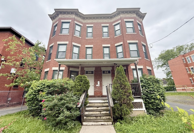 54 Edgewood St Unit A, Hartford, CT 06112 - view of front of home featuring brick siding and covered porch