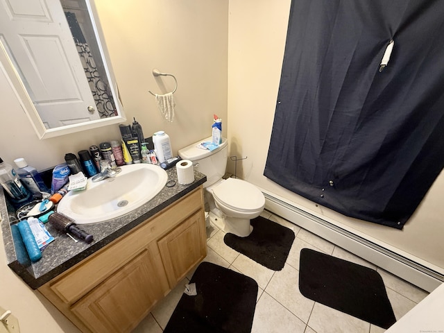 54 Edgewood St Unit A, Hartford, CT 06112 - full bath featuring a baseboard heating unit, tile patterned floors, vanity, and toilet