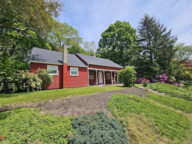 100 Morin Ave, Killingly, CT 06239 - back of property featuring a porch and a chimney