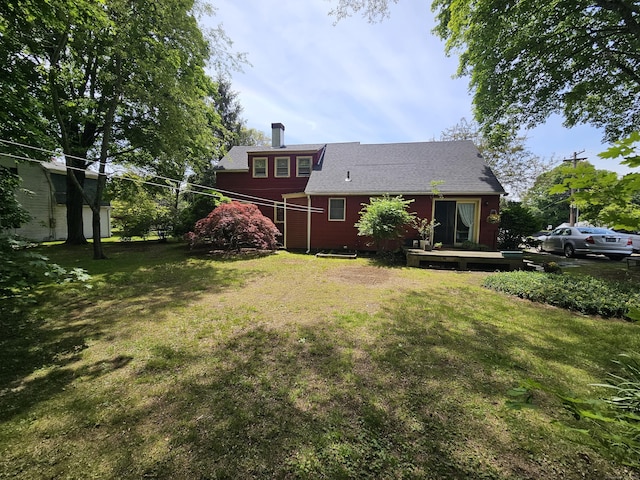 100 Morin Ave, Killingly, CT 06239 - back of house with a lawn and a wooden deck