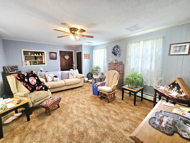 100 Morin Ave, Killingly, CT 06239 - living room featuring carpet flooring, ceiling fan, crown molding, and a textured ceiling