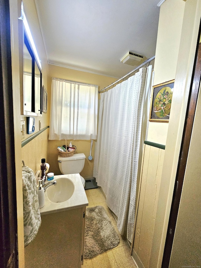 100 Morin Ave, Killingly, CT 06239 - bathroom with vanity, toilet, curtained shower, and tile patterned flooring
