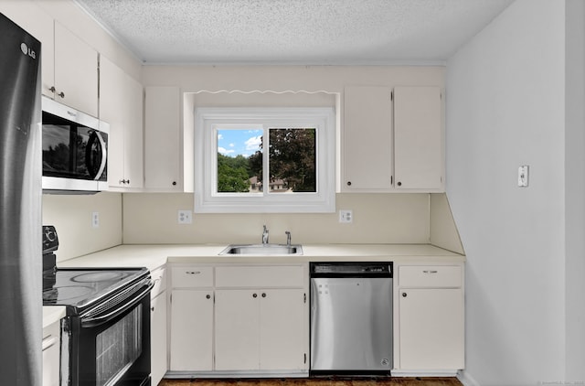 207 Summer Hill Dr Unit 207, South Windsor, CT 06074 - kitchen featuring appliances with stainless steel finishes, white cabinets, light countertops, and a textured ceiling