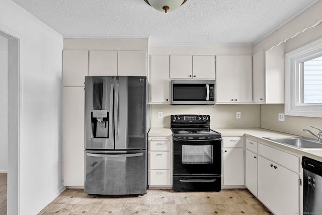 207 Summer Hill Dr Unit 207, South Windsor, CT 06074 - kitchen with stainless steel appliances, light countertops, a textured ceiling, and white cabinetry
