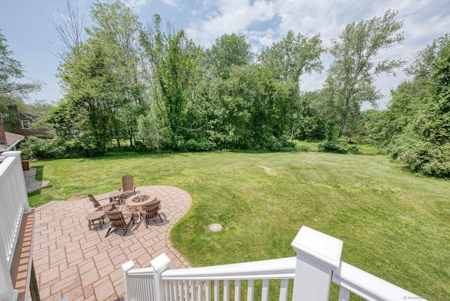 169 Dunn Rd, Coventry, CT 06238 - view of green lawn featuring a patio and a fire pit