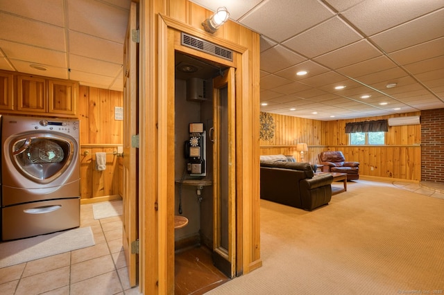169 Dunn Rd, Coventry, CT 06238 - laundry area with wooden walls, cabinet space, washer / dryer, and recessed lighting