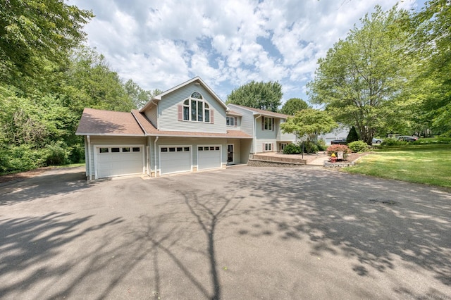 169 Dunn Rd, Coventry, CT 06238 - view of front of house with driveway and an attached garage