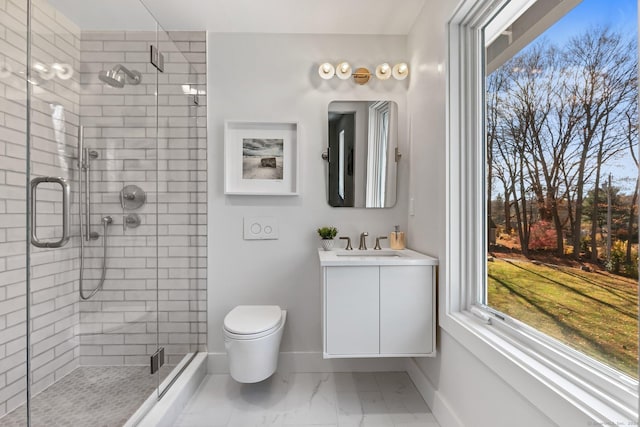 261 N St, Ridgefield, CT 06877 - full bathroom featuring marble finish flooring, vanity, a shower stall, baseboards, and toilet