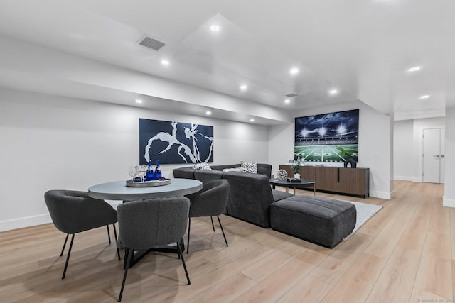 261 N St, Ridgefield, CT 06877 - dining area with light wood-style floors, baseboards, and recessed lighting