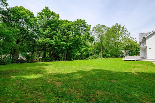 261 N St, Ridgefield, CT 06877 - view of green lawn featuring a wooden deck