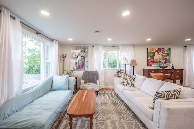 211 Brainard Rd, Enfield, CT 06082 - living area featuring recessed lighting, baseboards, and wood finished floors