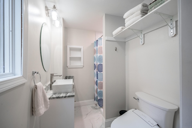 211 Brainard Rd, Enfield, CT 06082 - bathroom with marble look tile flooring, vanity, toilet, and a shower with curtain