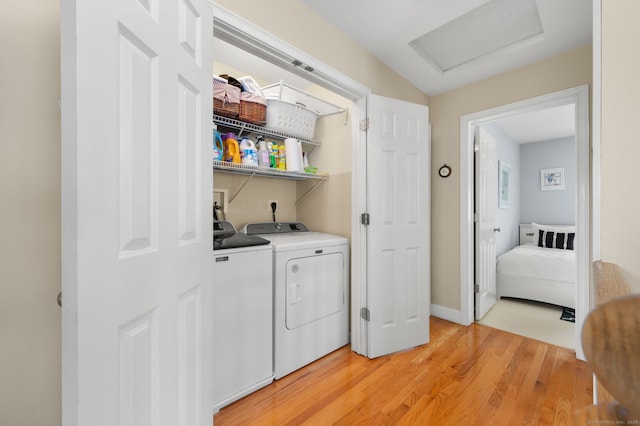 26 Parkway S, New London, CT 06320 - laundry room featuring attic access, washing machine and dryer, and light wood-type flooring