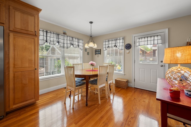 26 Parkway S, New London, CT 06320 - dining area with light wood-style floors and baseboards