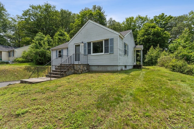 4 Buttonball Dr, Newtown, CT 06482 - view of front of house featuring a front yard and roof with shingles