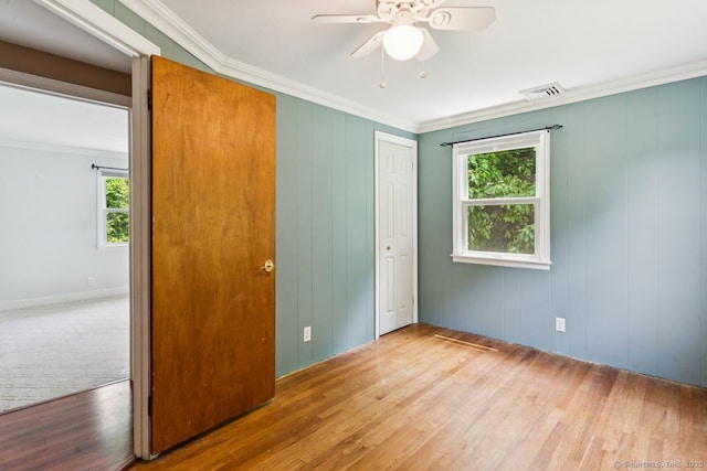4 Buttonball Dr, Newtown, CT 06482 - unfurnished bedroom featuring ornamental molding, wood finished floors, a closet, and ceiling fan