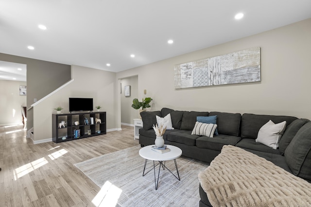 13 Williams Ct, Wolcott, CT 06716 - living area with light wood finished floors, recessed lighting, stairs, and baseboards