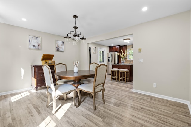13 Williams Ct, Wolcott, CT 06716 - dining area with baseboards, light wood-style floors, recessed lighting, and a chandelier