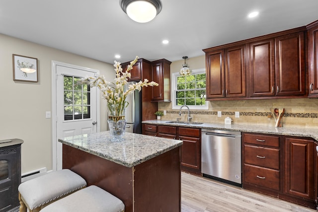 13 Williams Ct, Wolcott, CT 06716 - kitchen featuring dishwasher, a sink, light wood-type flooring, tasteful backsplash, and recessed lighting