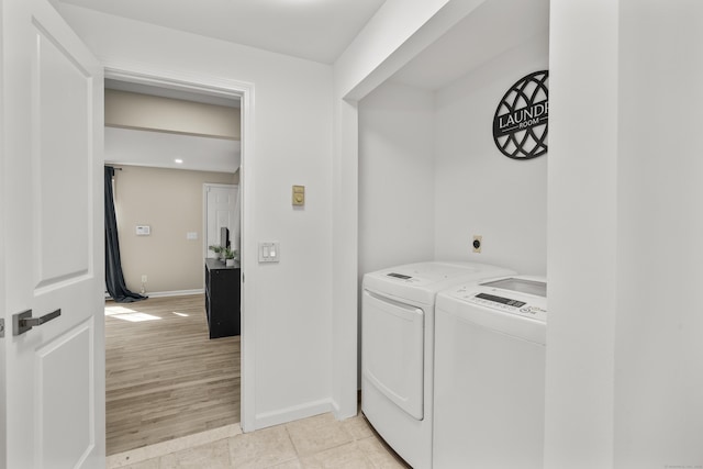 13 Williams Ct, Wolcott, CT 06716 - laundry area with separate washer and dryer, baseboards, light wood-style floors, and recessed lighting
