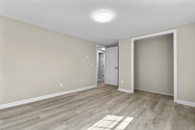 13 Williams Ct, Wolcott, CT 06716 - unfurnished bedroom with light wood-type flooring and baseboards