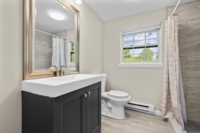 13 Williams Ct, Wolcott, CT 06716 - full bath featuring a baseboard radiator, toilet, vanity, and tiled shower