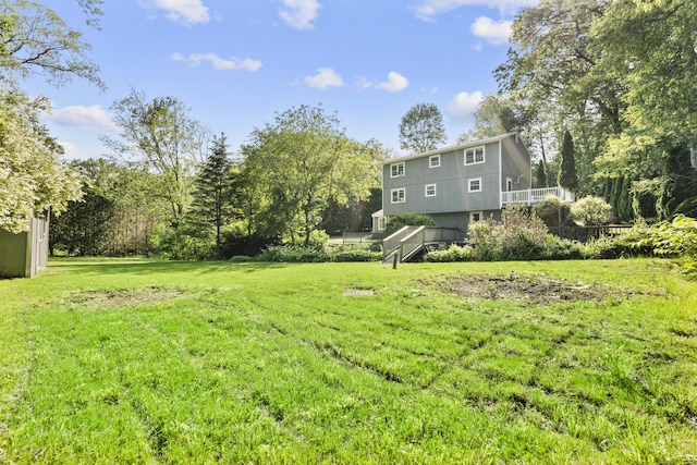 13 Williams Ct, Wolcott, CT 06716 - view of grassy yard featuring a deck