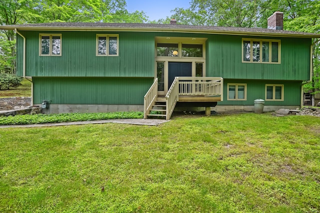 30 Bartling Dr, Easton, CT 06612 - view of front of house featuring a chimney, a front lawn, and a wooden deck