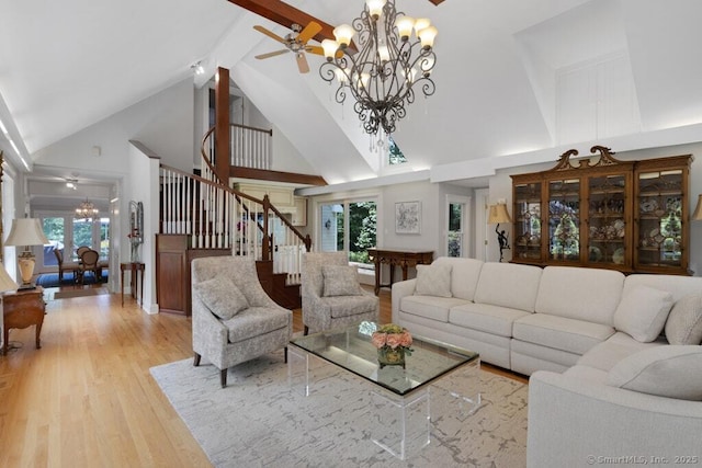 132 Old N Stamford Rd, Stamford, CT 06905 - living area with high vaulted ceiling, a chandelier, ceiling fan, light wood finished floors, and beam ceiling
