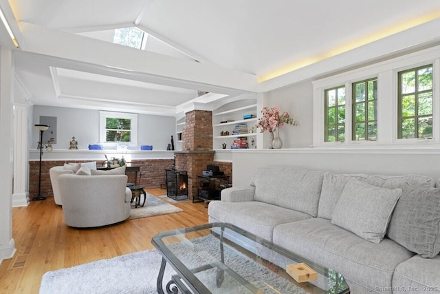 132 Old N Stamford Rd, Stamford, CT 06905 - living area featuring light wood-type flooring and vaulted ceiling