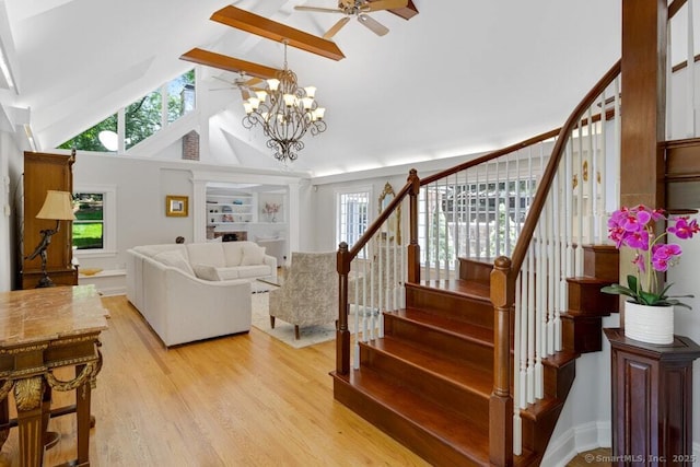 132 Old N Stamford Rd, Stamford, CT 06905 - stairway featuring a ceiling fan, healthy amount of natural light, wood finished floors, beamed ceiling, and high vaulted ceiling