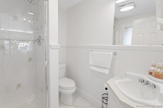 132 Old N Stamford Rd, Stamford, CT 06905 - full bathroom featuring a stall shower, toilet, vanity, and a wainscoted wall