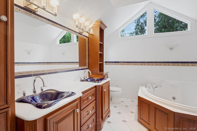 132 Old N Stamford Rd, Stamford, CT 06905 - full bath featuring lofted ceiling, tile walls, a tub with jets, wainscoting, and toilet