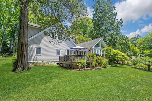132 Old N Stamford Rd, Stamford, CT 06905 - back of house with a wooden deck and a lawn