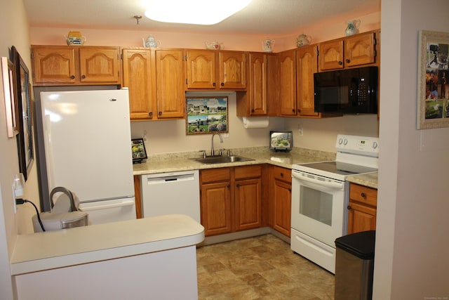 106 S Putter Dr Unit 106, Wallingford, CT 06492 - kitchen with white appliances, a sink, light countertops, and brown cabinetry