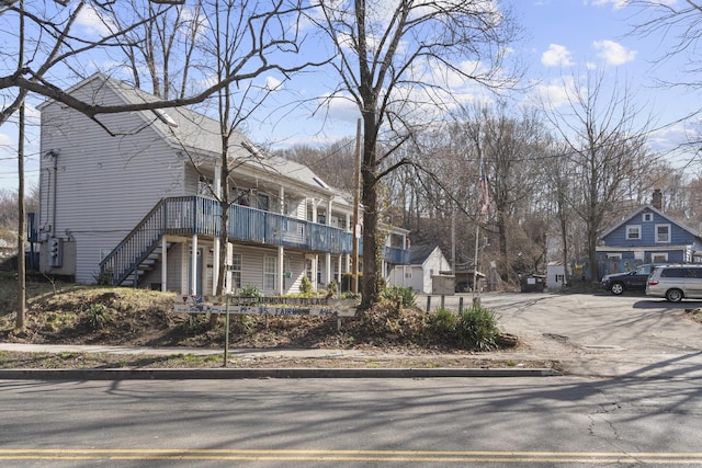 19 Fairmont Ave, New Haven, CT 06513 - view of asphalt road featuring stairway, curbs, and sidewalks