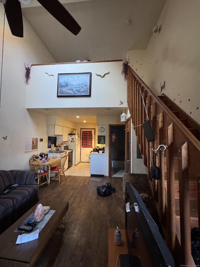 19 Fairmont Ave, New Haven, CT 06513 - living room with light wood-type flooring, a ceiling fan, a high ceiling, and stairway