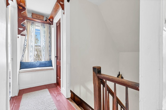 187 Whitehall Ave, Stonington, CT 06355 - hallway with an upstairs landing, wood finished floors, baseboards, and lofted ceiling