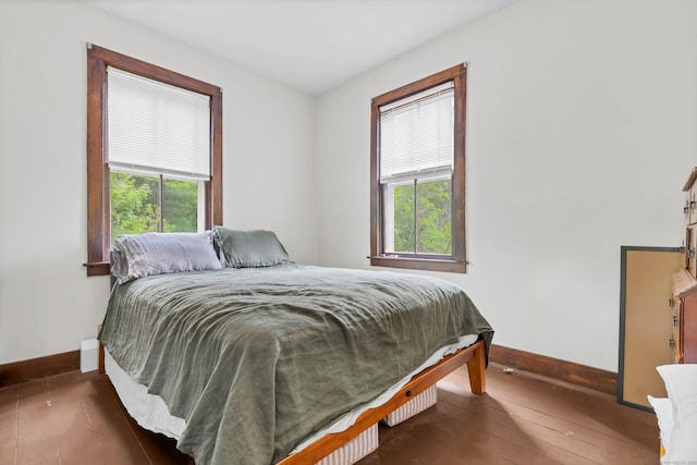 187 Whitehall Ave, Stonington, CT 06355 - bedroom featuring baseboards, multiple windows, and wood-type flooring