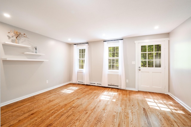 239 Old Farms Rd Apt 15B, Avon, CT 06001 - spare room featuring wood finished floors, baseboards, and recessed lighting