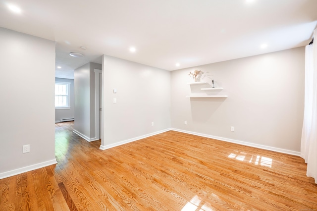 239 Old Farms Rd Apt 15B, Avon, CT 06001 - spare room with light wood-style flooring, baseboards, and recessed lighting
