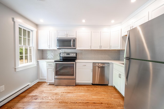 239 Old Farms Rd Apt 15B, Avon, CT 06001 - kitchen featuring stainless steel appliances, a baseboard radiator, light countertops, white cabinetry, and light wood-style floors