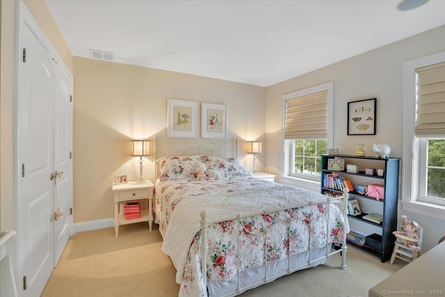 2 Lake Louise Dr, Westbrook, CT 06498 - bedroom with light colored carpet, multiple windows, and baseboards