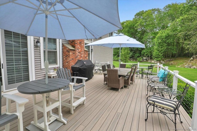 2 Lake Louise Dr, Westbrook, CT 06498 - wooden terrace with outdoor dining space and a grill