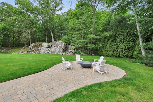 2 Lake Louise Dr, Westbrook, CT 06498 - view of patio with an outdoor fire pit