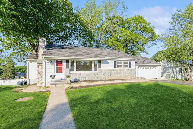 20 Karen Rd, Danbury, CT 06811 - view of front facade with a front yard, a chimney, asphalt driveway, and an attached garage